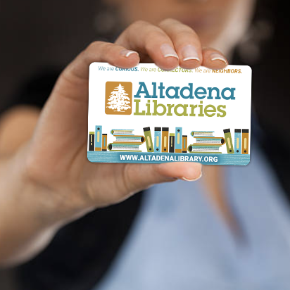 Hand holding an Altadena Library card